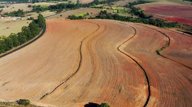 Harvesting In Teofilo Otoni Minas Gerais Brazil. Aerial View Of Contrasting Farming Techniques On Adjacent Fields. Rural Road Valley Farming Awesome. Rural Road Summer Countryside.
