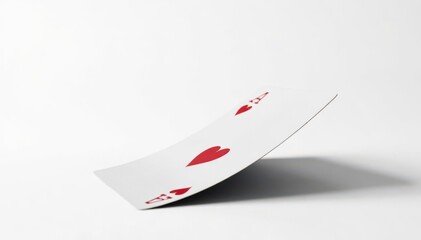 Side view of a flipped playing card, isolated on white , spades, hearts, symbol