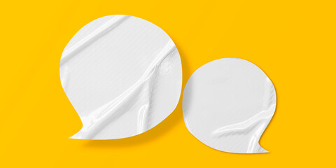 White speech bubble crumpled paper isolated on yellow background