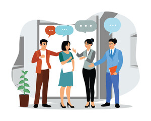 Colleagues engaged in a friendly discussion in a modern office setting.