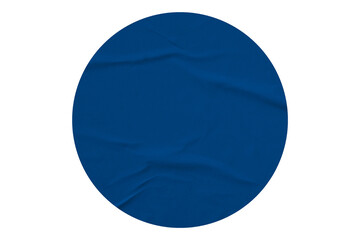 blue circle sticker with crumpled edges. Wrinkled round paper isolated on transparent background.