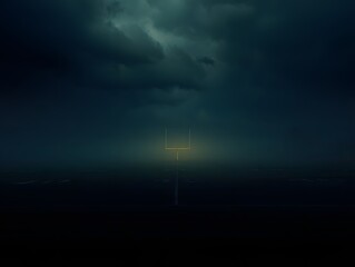 Obraz premium The stark contrast between the dark sky and the brightly lit object creates a dramatic and surreal feel. The image evokes a sense of mystery and wonder, a beacon of light in a vast darkness