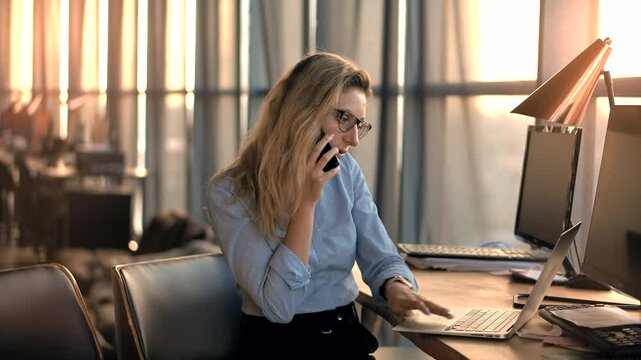 Businesswoman booker overworked on project deadline . Overtime work