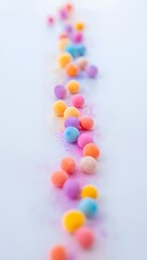 Obraz premium A vibrant, colorful collection of small candies delicately arranged, evoking the pure delight of childhood and the simple joys of a sweet treat. 