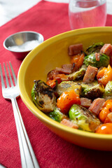 A view of a plate of marinated Brussel sprouts.