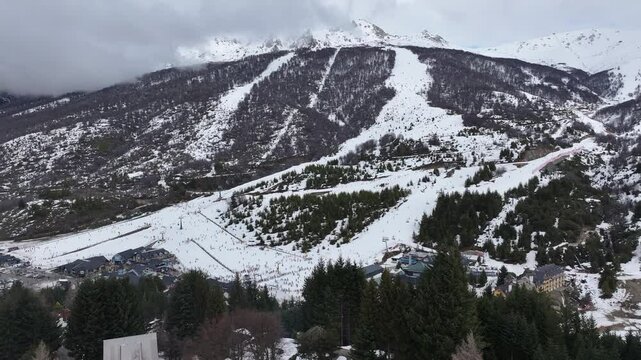 Cerro Catedral In Bariloche Rio Negro Argentina. Chair Lift Transporting Skiers And Snowboarders. Nature Travel Destination Snow Covered Forest Trees. Nature Landmark Patagonia Above View.