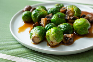 A view of a plate of marinated Brussels sprouts.