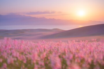 Fototapeta premium An ethereal sunrise paints a serene landscape, featuring a vibrant field of pink flowers set against a backdrop of rolling hills and a tranquil lake. 