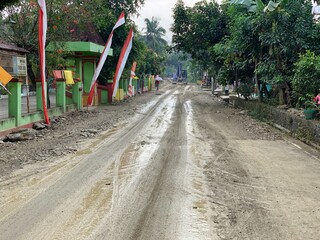 The condition damaged roads during the rainy season which are used by many vehicles such as cars...