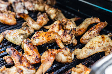 Cooking chicken wings in barbecue