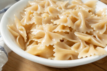 A closeup view of a bowl of gluten-free farfalle.