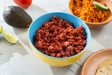 A view of a bowl of Mexican chorizo meat.
