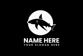 Aggressive black silhouette vector logo of a shark surrounded by abstract bubbles and water splashes. Ocean life concept