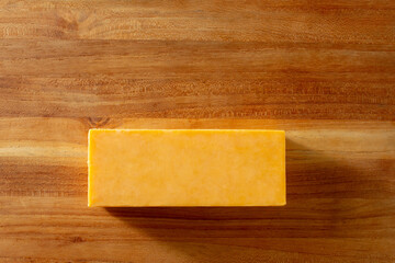 A top down view of a block of cheddar cheese. © DAVID