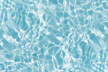 Blue water with ripples on the surface. Defocus blurred transparent blue colored clear calm water surface texture with splashes and bubbles. Water waves with shining pattern texture background.