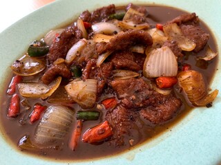Black pepper beef on the plate. Delicious, tasty, and healthy food that making in the kitchen. Homemade food, healthy lifestyle