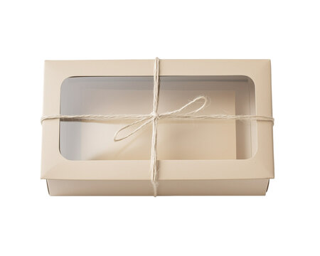 Beige box with window tied with twine