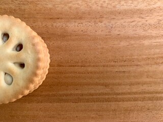 Close up of biscuits on a texture background. Biscuits with wooden background. Delicious and tasty