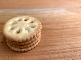 Close up of biscuits on a texture background. Biscuits with wooden background. Delicious and tasty