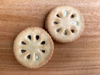 Close up of biscuits on a texture background. Biscuits with wooden background. Delicious and tasty