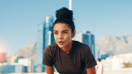 Breathing, exercise and thinking with woman in city for break from cardio training or running....