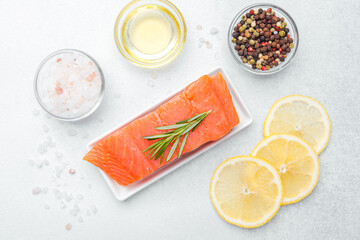 Fresh salmon fillet with herbs and spices ready for gourmet cooking