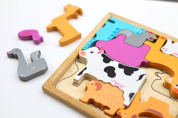 colorful animals puzzle with missing piece