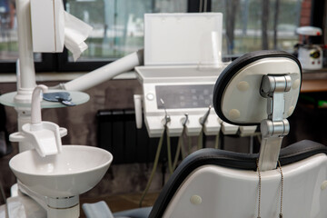 Back view of dental chair and clinic equipment
