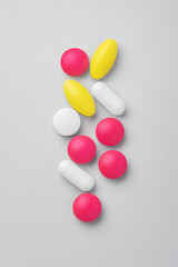 Medical pills, tablet, drugs on grey background