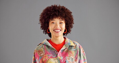 Urban, fashion and studio portrait of woman with smile, confidence and cool afro style at...