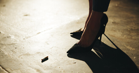 Cigarette, high heels and shadow of woman on concrete for attitude or beating addiction in evening....