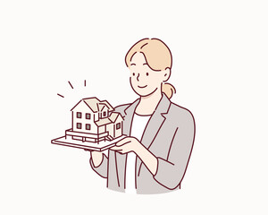 Architect Holding a House Model. Hand drawn style vector design illustrations.