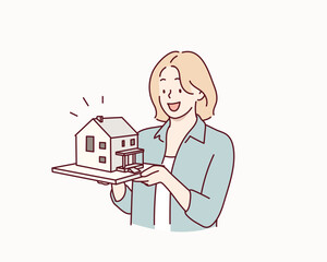 Architect Holding a House Model. Hand drawn style vector design illustrations.
