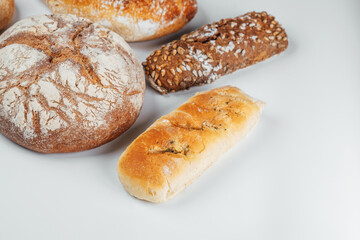 Freshly baked bread loaves displayed on a neutral background