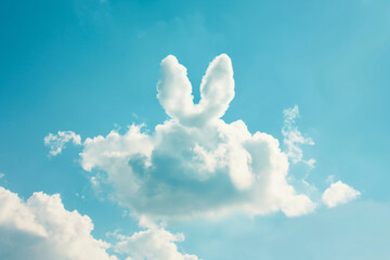 Cloud shaped like a rabbit in a clear blue sky, creating a whimsical and playful atmosphere during the day. Generative AI