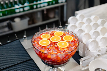 bowl of a mocktail with orange slice
