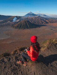 Travelers relax and enjoy the morning scenery at Mount Bromo. Located in Bromo, Tengger, Semeru National Park, East Java, Indonesia.