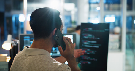 Office, man and developer with computer screen for phone call, coding consulting and back with contact. Night, business person and programmer with mobile for IT support, talking and software update