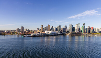 Fototapeta premium Beautiful View of Downtown Vancouver Skyline Over Calm Harbor Waters