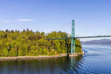 Suspension Bridge Stretching Over Stanley Park and Water in Vancouver, BC