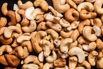 Close-up view of a pile of roasted cashews