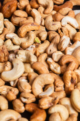 Close-up view of a pile of roasted cashews