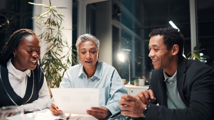 Documents, night and business people in discussion for financial review, budget report and feedback. Corporate team, meeting and workers with paperwork for collaboration, strategy and planning
