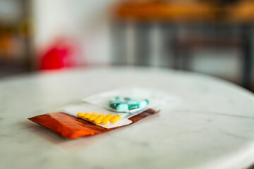 Medicine bag containing capsules and tablets of patient in room concept of people getting medicine for illness nowadays.	
