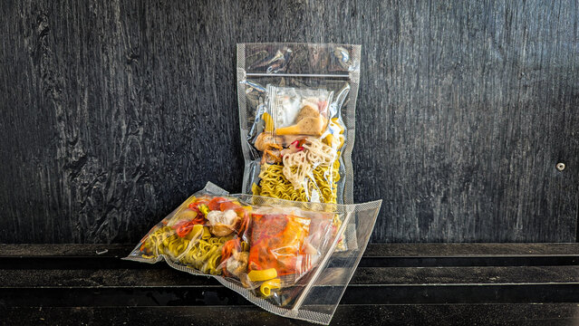 Instant dry seblak (spicy savory wet chips) complete with spices and wrapped in plastic packaging