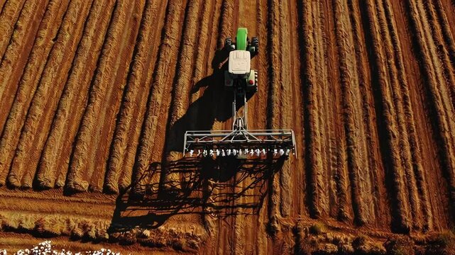 Tractor Working Through Cotton Crops