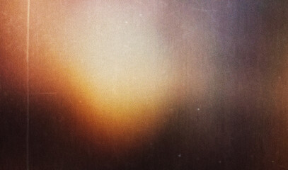 Plakat grainy colorful warm rainbow red light leaks on black background with dust texture. abstract damaged scratched retro film analog effect for using over photos as overlay or screen filter