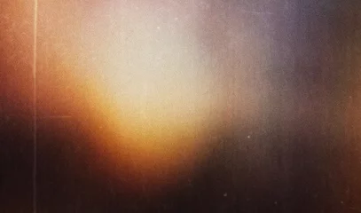 Fotobehang Retro grainy colorful warm rainbow red light leaks on black background with dust texture. abstract damaged scratched retro film analog effect for using over photos as overlay or screen filter  © Uuganbayar