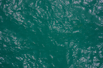 Abstract Pattern of Sparkling Ocean Water Surface Under Bright Sunlight