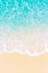 Obraz na płótnie Canvas Beach shoreline with turquoise ocean waves washing onto yellow sand viewed from above. Aerial beach image for banner with copy space. Summer vacation and tropical paradise concept.